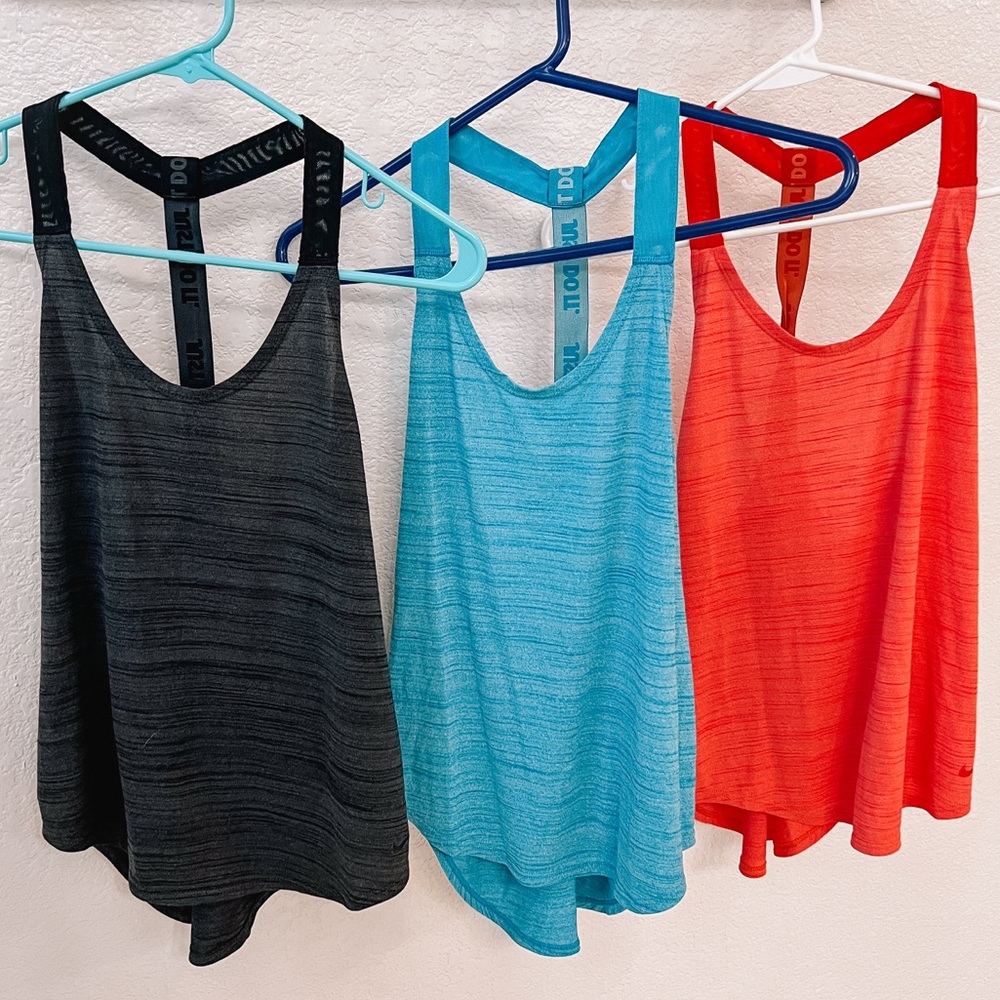 Nike tanks (set of 3). Black, blue, and red. Size extra small
